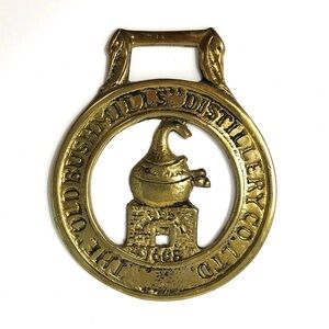 Vintage English The Old Bushmills Distillery Co. Ltd. horse brass medallion